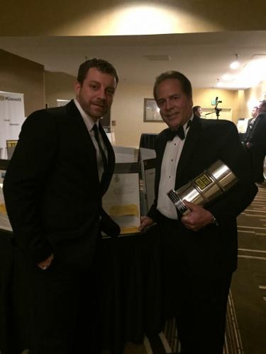 Nathan as a young Vice President of Operations Support and his CEO, Joe Monroe.